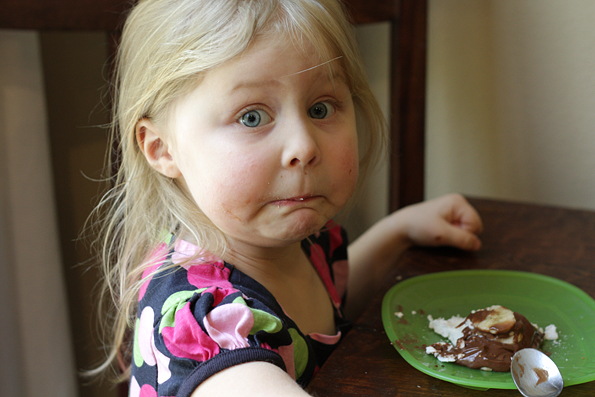 Squirrel contemplates running out of Nutella