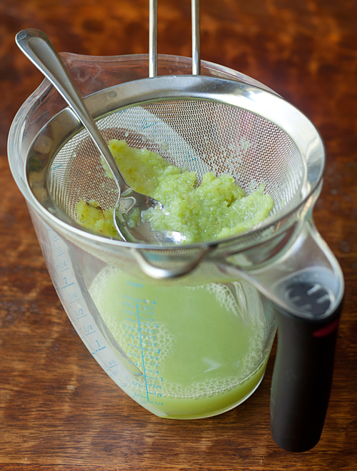 Pressing juice out of grape puree