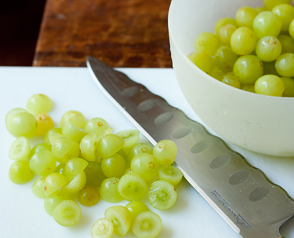 Slicing fresh California green grapes
