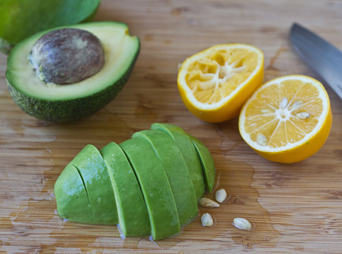 Fresh avocado sprinkled with lemon juice