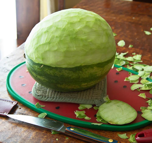 Peeling a watermelon