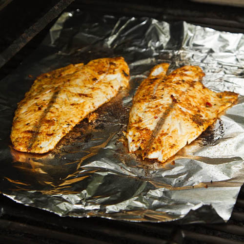 Grilling barramundi fillets