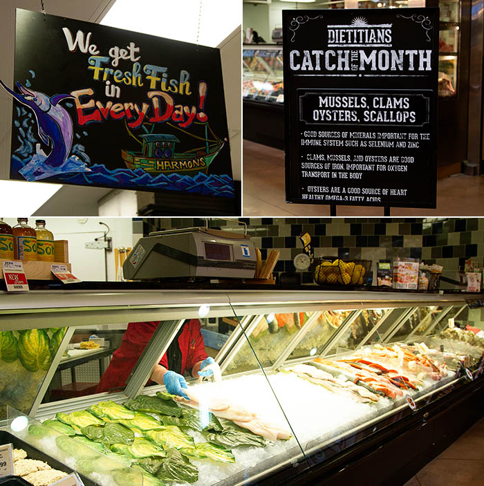 Kathy setting up the seafood case at Harmons Grocery Store