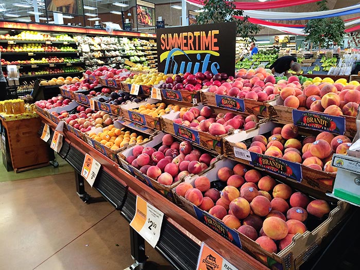 Buying fruit at Harmons Grocery Store