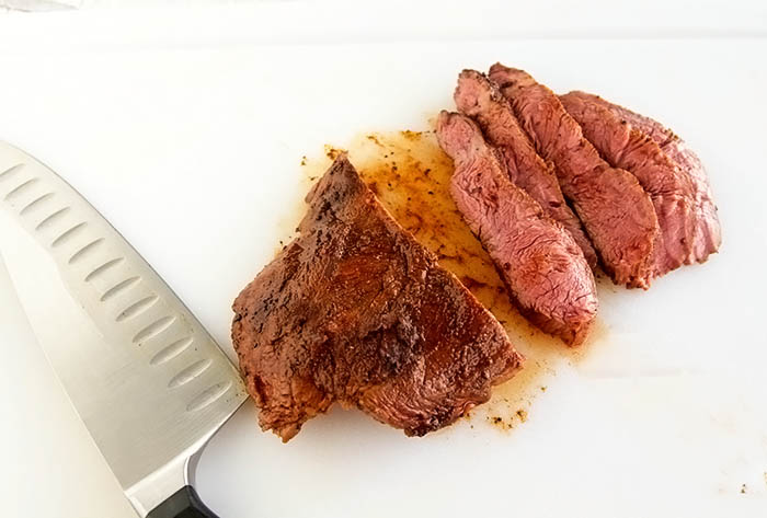 Sous vide cacao chili-rubbed flat iron steak