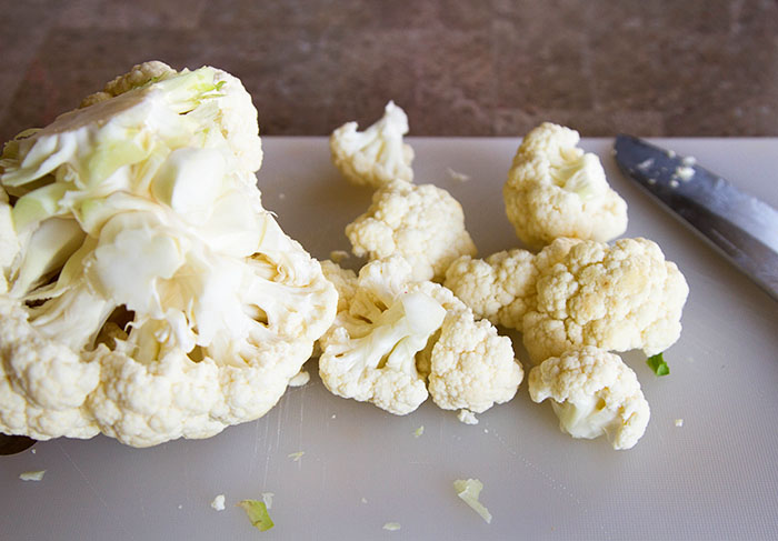 Cut cauliflower into florets