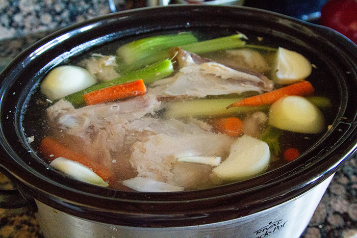 Making turkey bone broth in a slow cooker