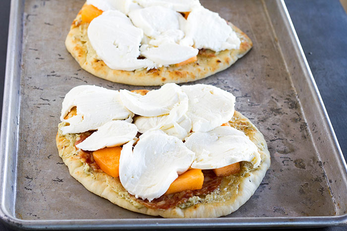 Cantaloupe Calabrese Naan Pizzas ready to go into the oven