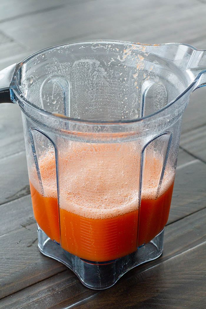 Making roasted carrot ramen broth