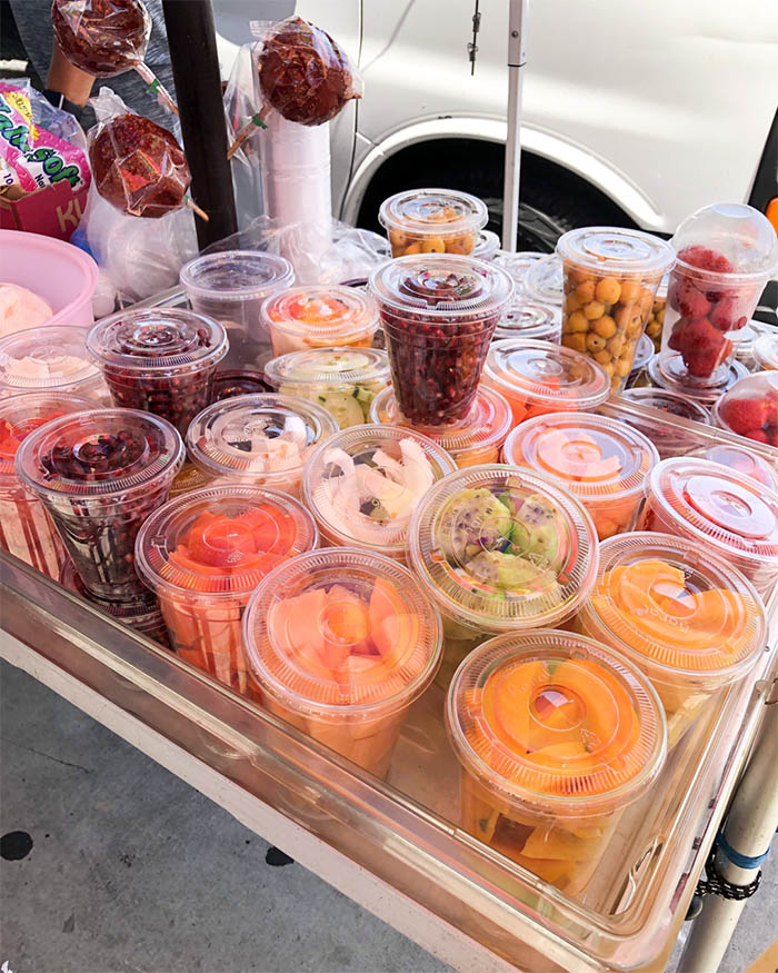 Vendor selling fresh fruit