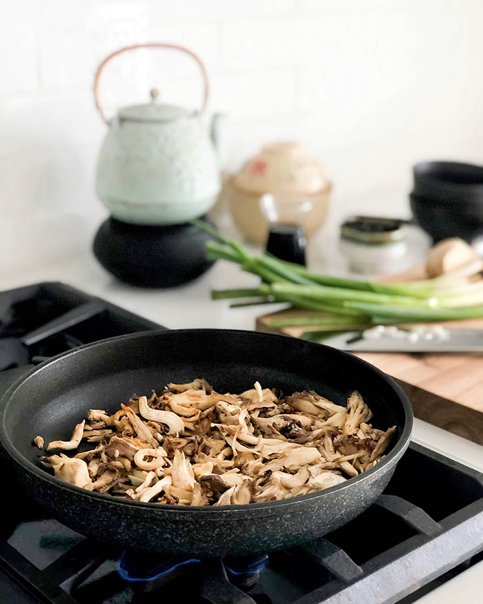 Cooking shredded oyster mushrooms