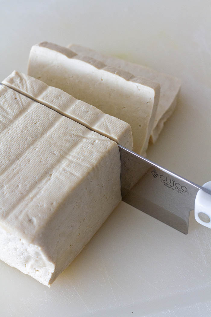 Cutting the tofu into cutlets